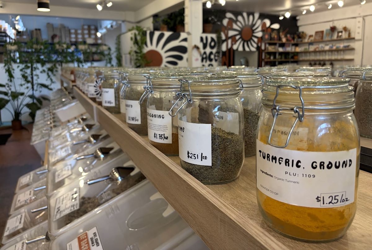 Jars of spices line the counter of a refillery in Portland, Oregon.