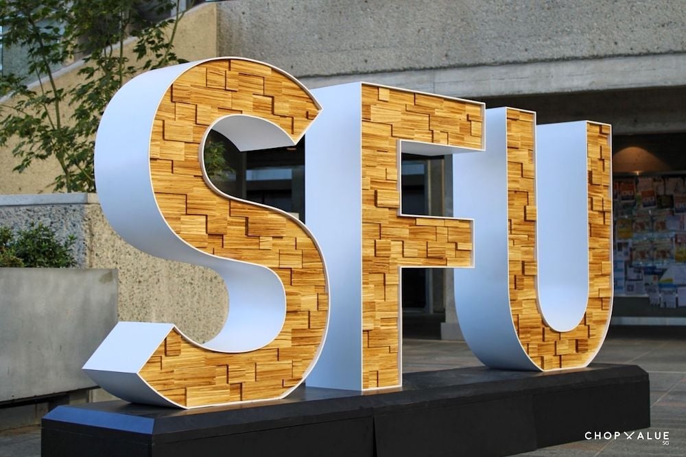 A sign made out of chopsticks reads ‘SFU.’