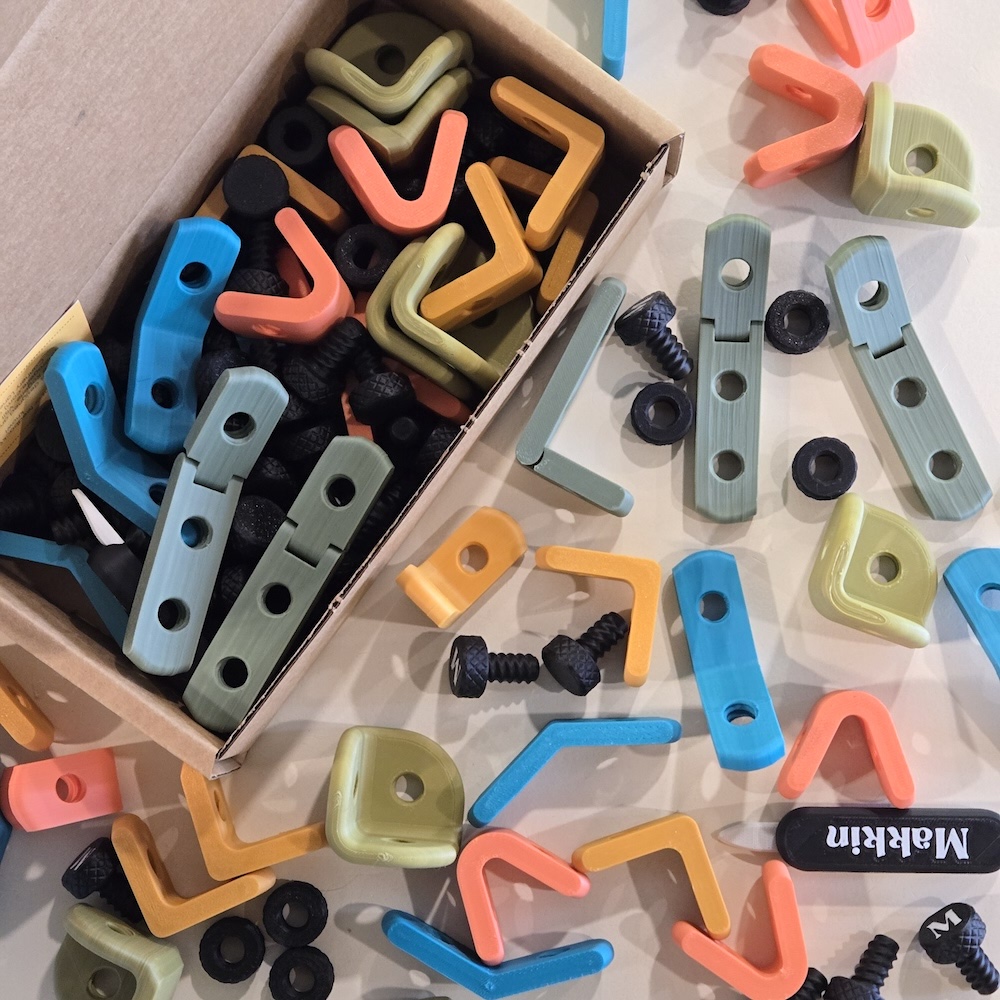Colorful children's toys on the table. One of the toys has the word 